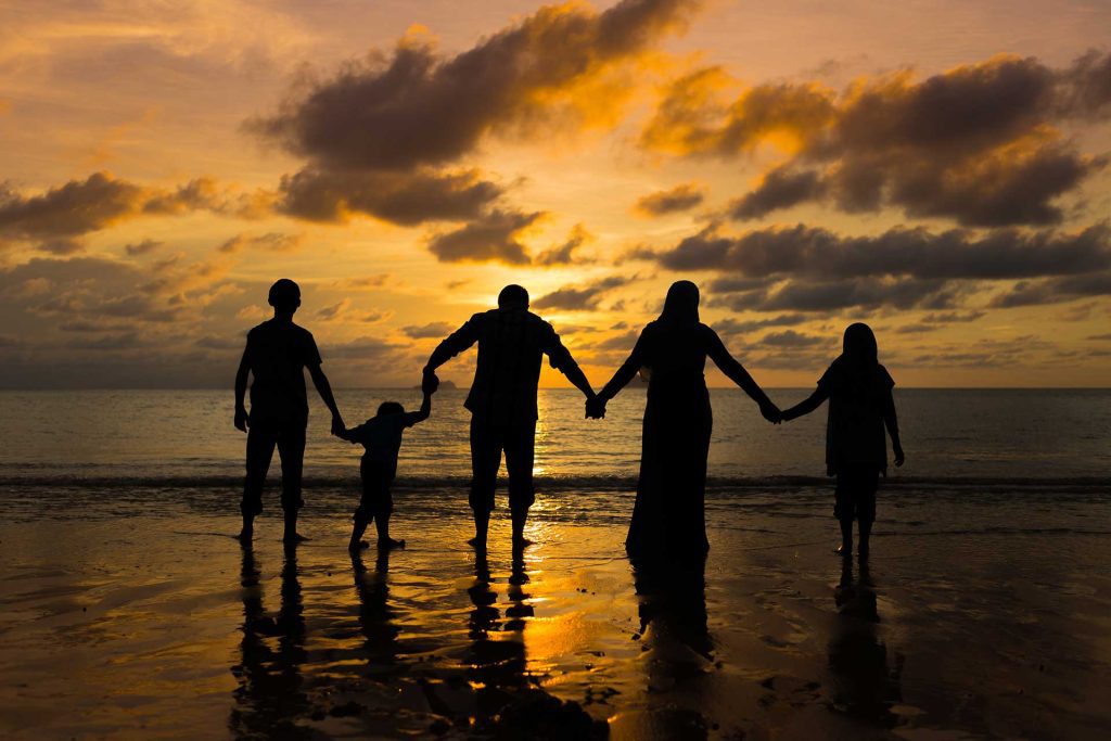 Family silhouette on beach | Family Therapy