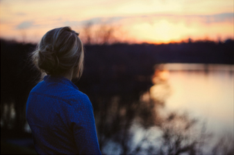 Woman looking over lake