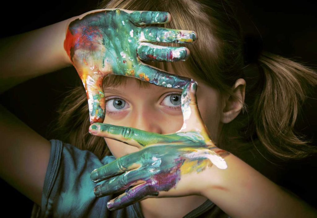 Child with paint on hands | Trauma focused-cognitive behavioral therapy
